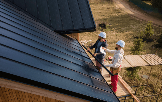 Two men managing roofing