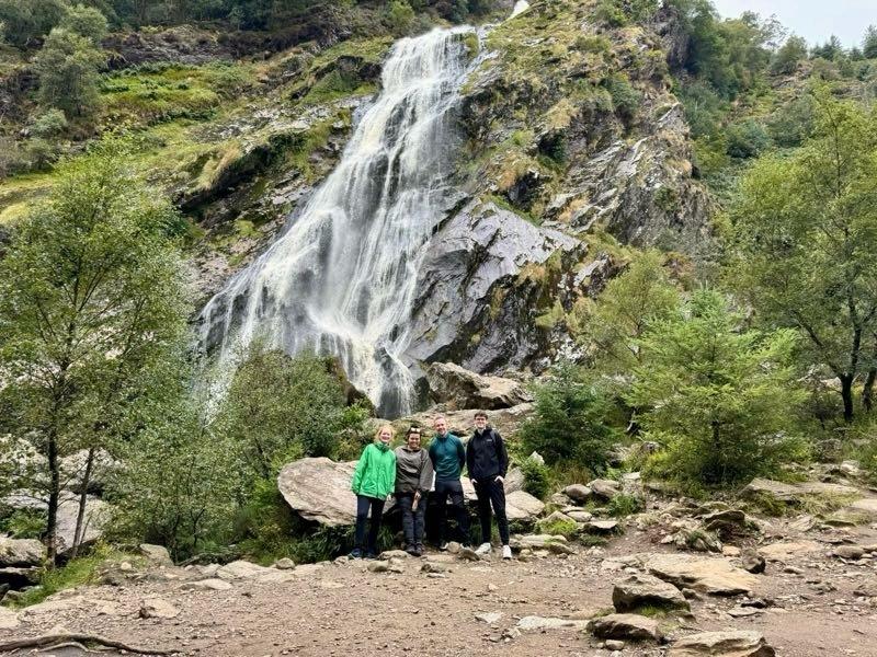 Team photo at Waterfall minus Florence